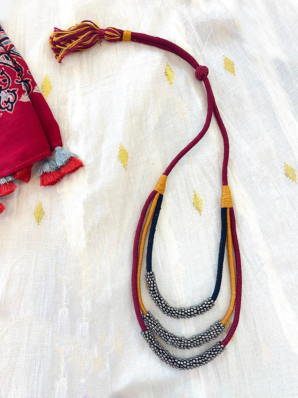 maroon mutlilayer necklaces